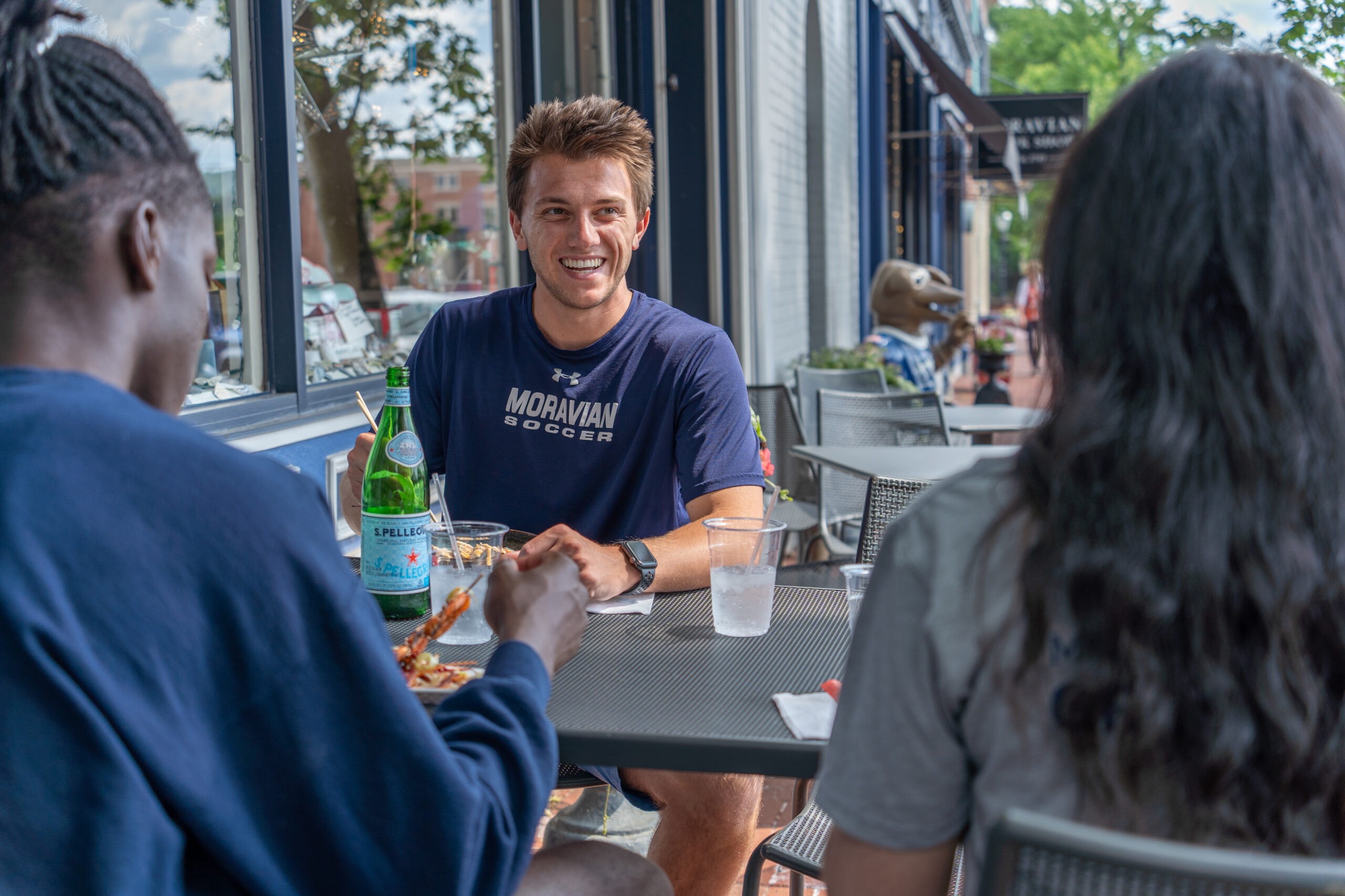 Students eating lunch on Main Street